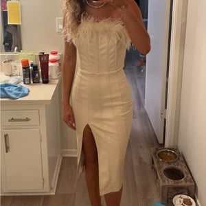 Pretty fun fur leather dress! Got from a cute boutique! Super pretty